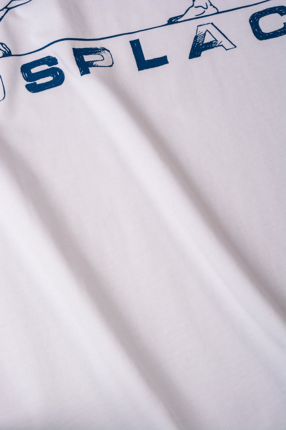 Fabric detail of Lionheart Olympus Boxy Tee - Snow White